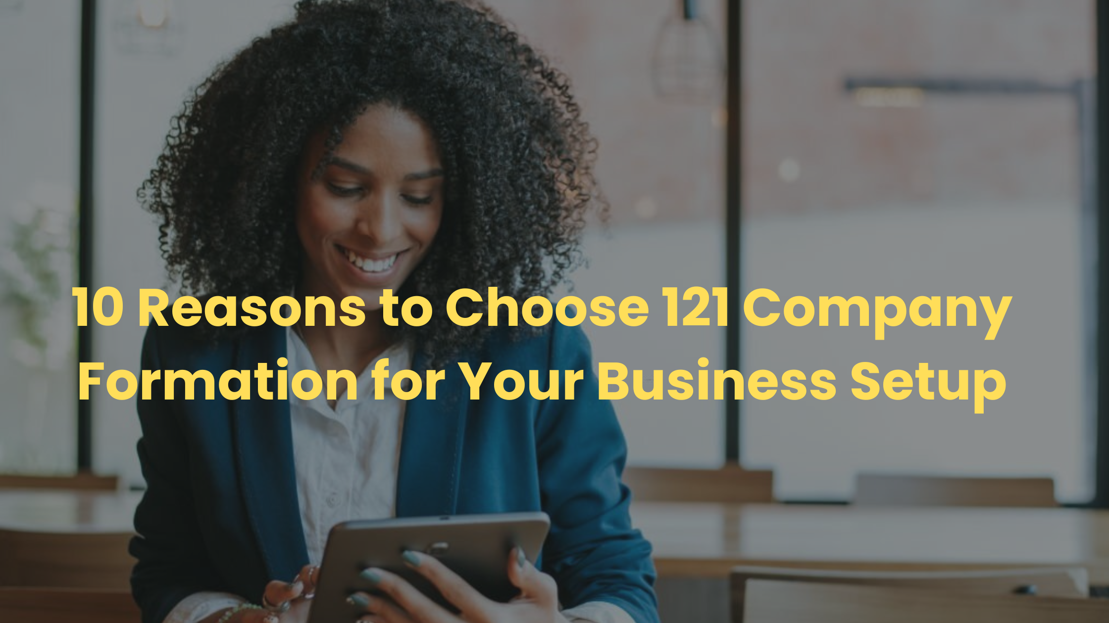 a woman using a tablet with the words 10 reasons to choose 121 company formation